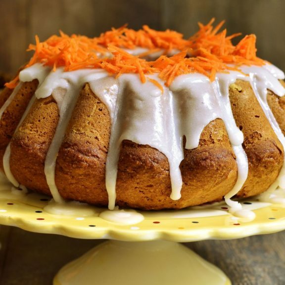 46952800 - carrot cake with sugar glaze on rustic background.
